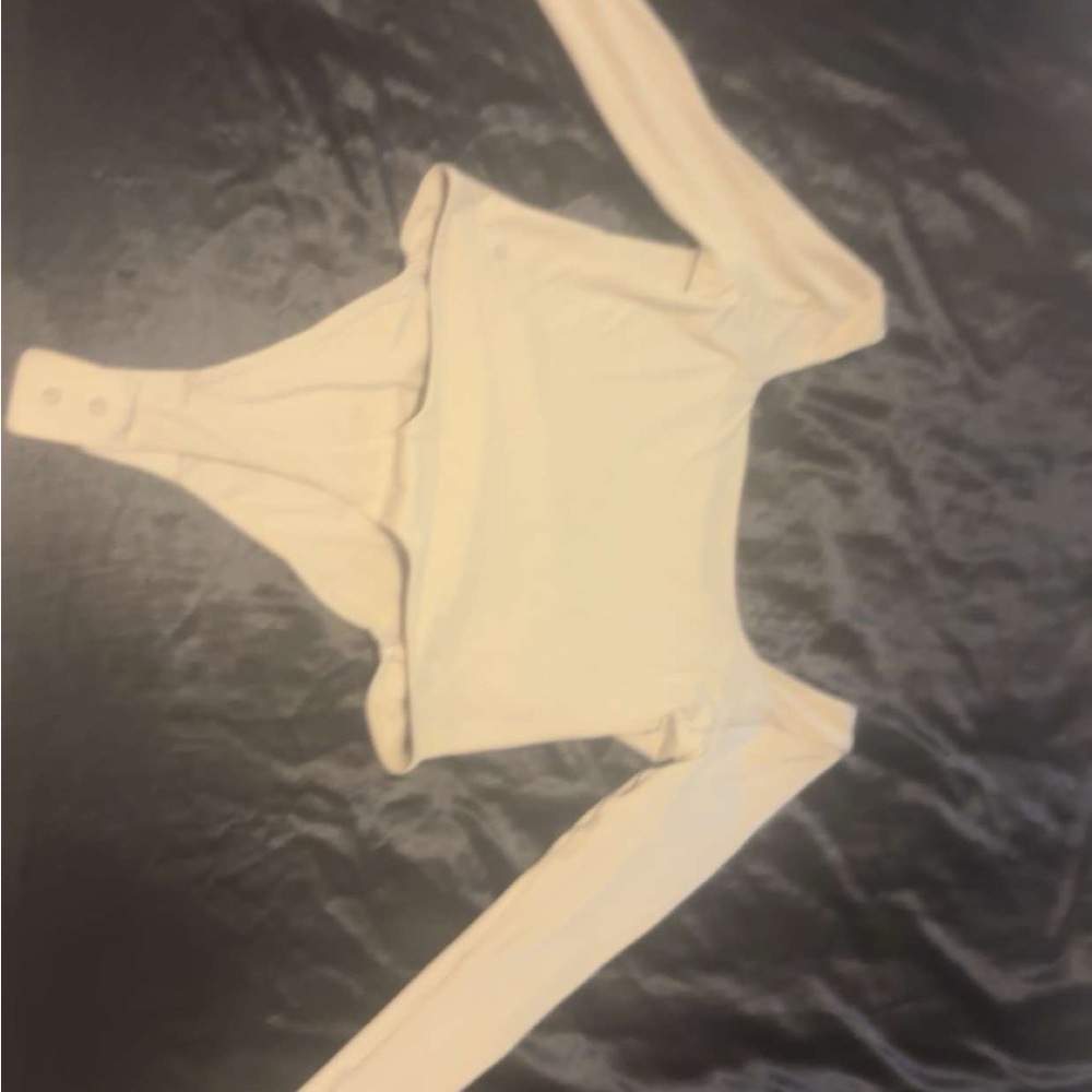 Lululemon Athletica Cream Bodysuit Top